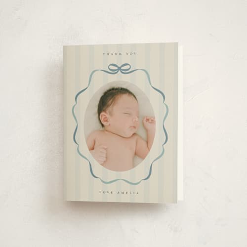 This is a lagoon baby thank you cards with standard by Lori Wemple called bows and stripes printing on strathmore in standard
