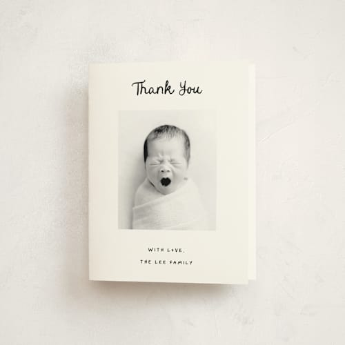 This is a snow baby thank you cards with standard by AK Graphics called cursive printing on strathmore in standard