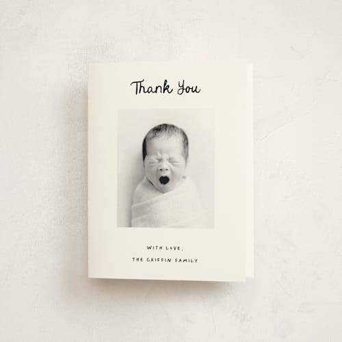 This is a snow kids thank you cards with standard by AK Graphics called cursive printing on strathmore in standard