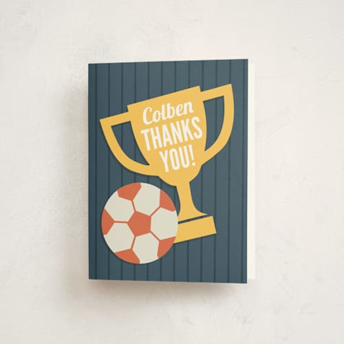 This is a navy kids thank you cards with standard by Jessie Steury called soccer game time printing on strathmore in standard
