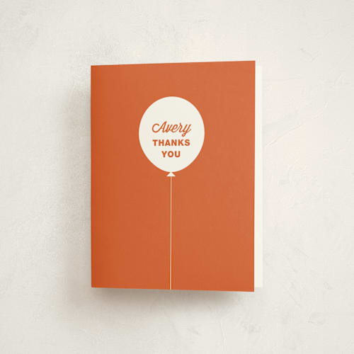 This is a burnt orange kids thank you cards with standard by Lori James called stacked balloon printing on strathmore in standard