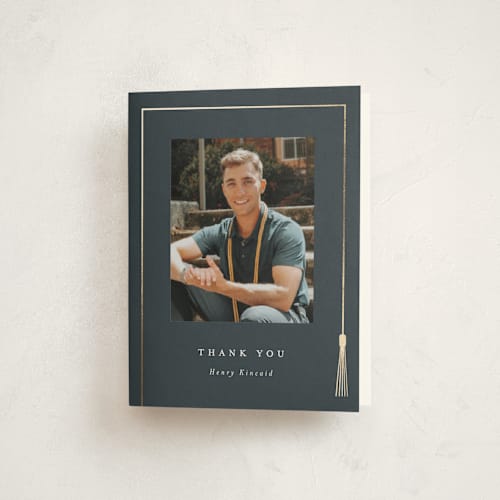 This is a dusty navy graduation thank you cards with foil pressed by AK Graphics called tasseled printing on strathmore in standard