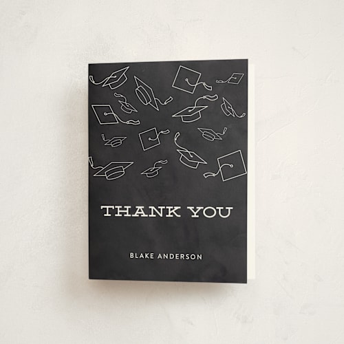 This is a chalkboard graduation thank you cards with standard by Sara Showalter called hats off to the grad printing on strathmore in standard