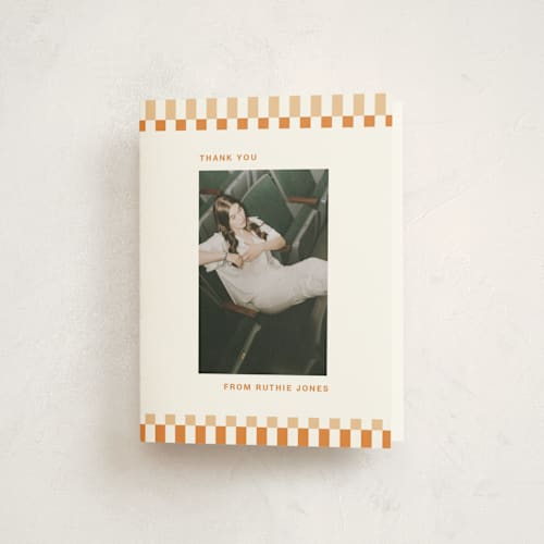 This is a apricot graduation thank you cards with standard by Rachel Cassel called checked out printing on strathmore in standard
