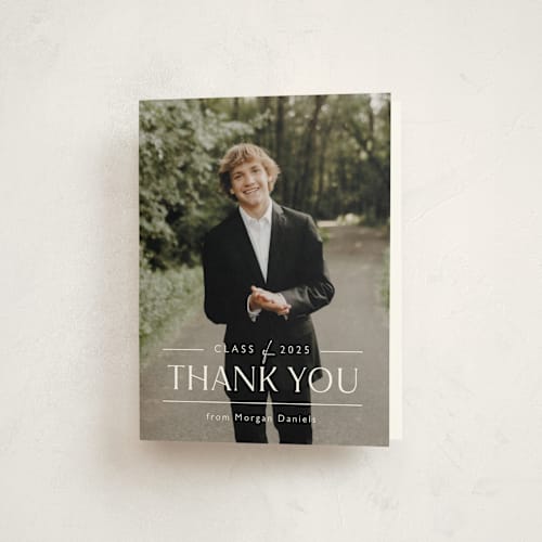 This is a eggshell graduation thank you cards with standard by Carolyn MacLaren called grad in overlay printing on strathmore in standard