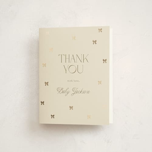 This is a vanilla baby shower thank you cards with foil pressed by Vera Lim called mini bows printing on strathmore in standard
