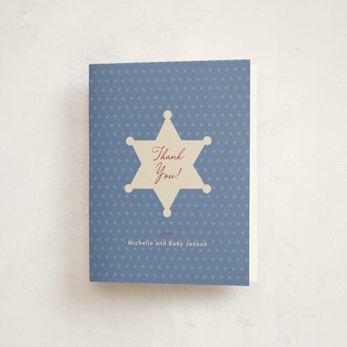 This is a cream baby shower thank you cards with standard by Ilene Guy called baby sheriff printing on strathmore in standard