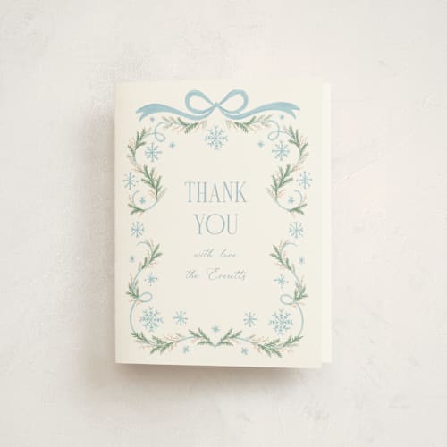 This is a frosted baby shower thank you cards with standard by Laura Hankins called winter frame printing on strathmore in standard