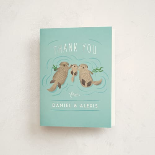 This is a aqua baby shower thank you cards with standard by Jennifer Wick called little otters printing on strathmore in standard
