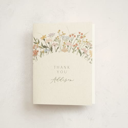 This is a vanilla baby shower thank you cards with standard by Jennifer Wick called meadow flowers printing on strathmore in standard