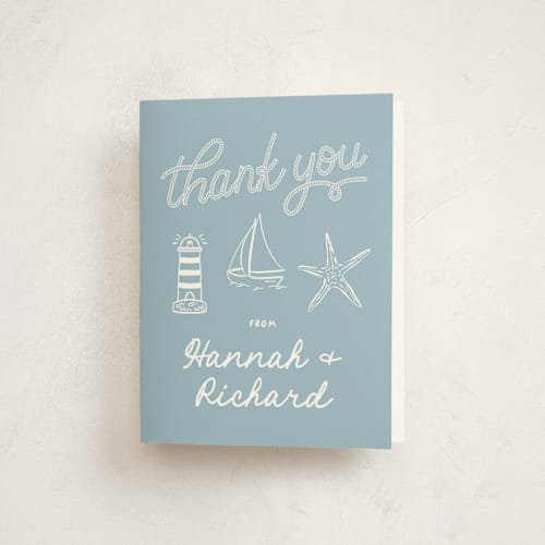 This is a powder blue baby shower thank you cards with standard by Claudia Orengo called nautical celebration printing on strathmore in standard