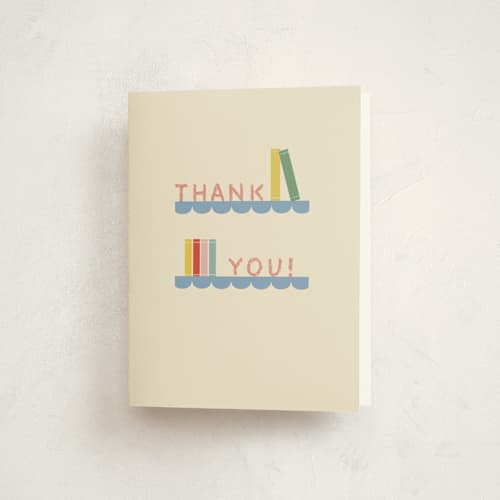 This is a classic library baby shower thank you cards with standard by Julia Starr called baby shelfie printing on strathmore in standard