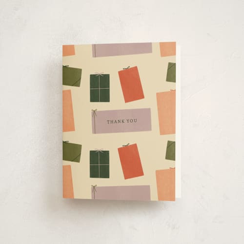 This is a cream thank you cards with standard by Sierra Lee called holiday gift swap printing on strathmore in standard