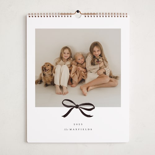 This is a noir photo calendars by Olivia Kanaley Inman called bow printing on premium calendar paper in grand
