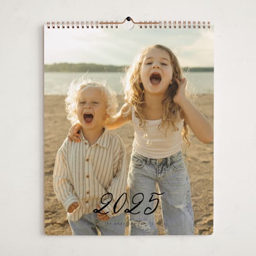 This is a ink photo calendars by Ashley Iwafuchi called greetings printing on premium calendar paper in grand