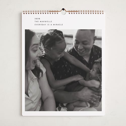This is a milk photo calendars by Sumak Studio called simple printing on premium calendar paper in grand