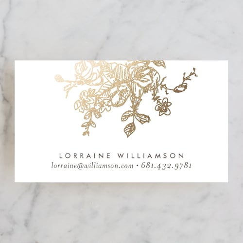 This is a cream business cards by Phrosné Barwood called gold sketched printing on signature in standard