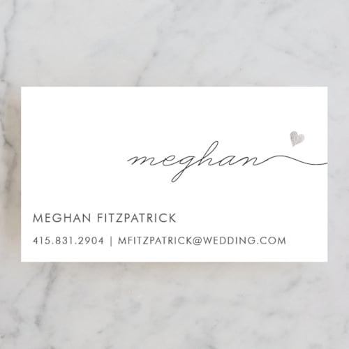 This is a silver business cards by Kim Dietrich Elam called love connection printing on signature in standard