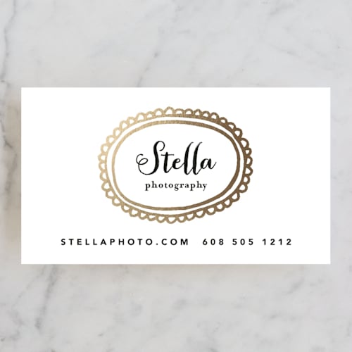 This is a gold business cards by Susan Brown called framed printing on signature in standard