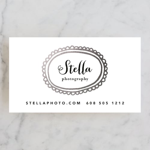 This is a silver business cards by Susan Brown called framed printing on signature in standard