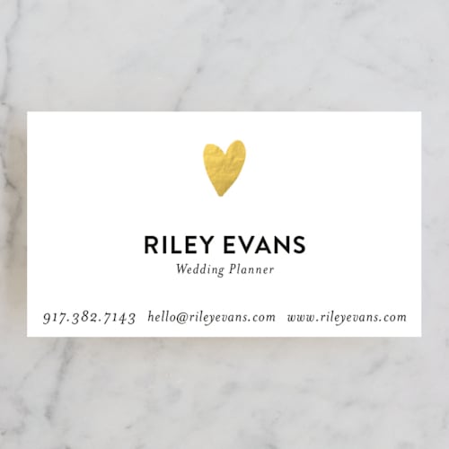 This is a gold business cards by Sarah Wrede called have a heart printing on signature in standard