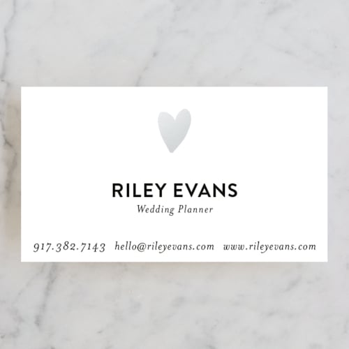 This is a silver business cards by Sarah Wrede called have a heart printing on signature in standard