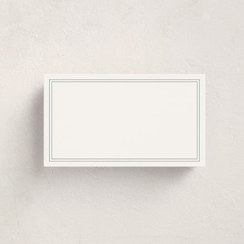 This is a dusty blue blank hosting stationery with standard by Jennifer Postorino called empire printing on signature in placecard