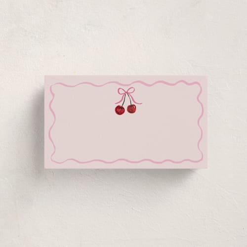 This is a blush blank hosting stationery with standard by Cass Loh called vintage wedding cake printing on signature in placecard