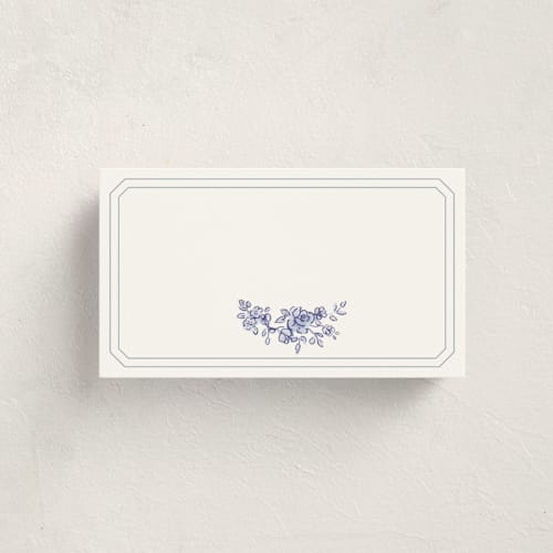 This is a dusty blue blank hosting stationery with standard by Cass Loh called watercolor flowers crest printing on signature in placecard