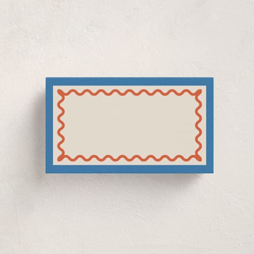This is a papaya blank hosting stationery with standard by Blustery August called party squiggle printing on signature in placecard