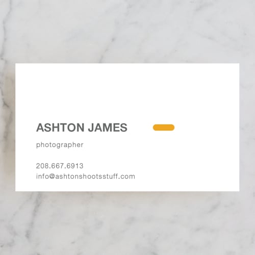 This is a hunter orange business cards by Jack Knoebber called manual printing on signature in standard