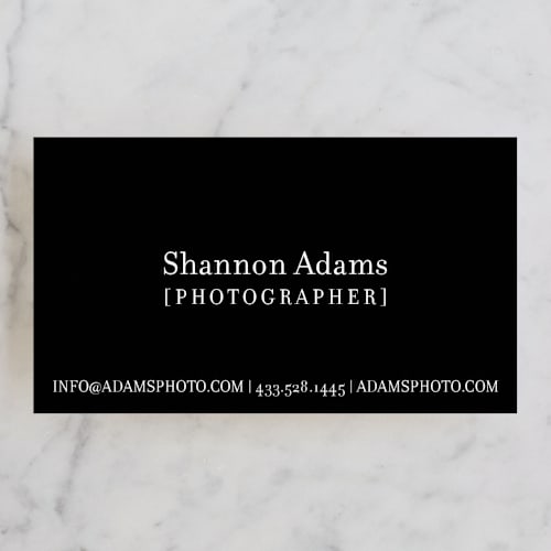 This is a graphite business cards by Kristin Royer called viewfinder printing on signature in standard