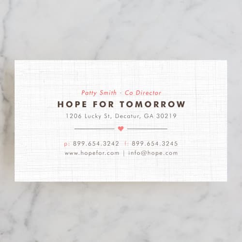 This is a pomegranate business cards by Kristen Smith called open hearts printing on signature in standard