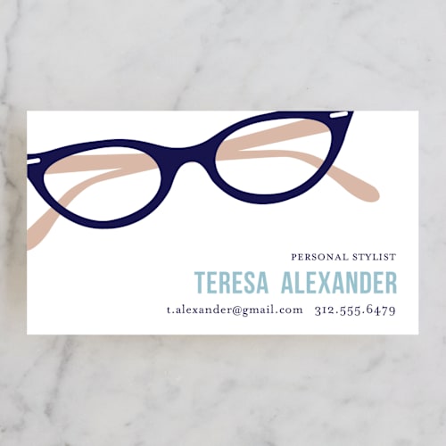 This is a cream, business cards by leslie hamer called specs printing on signature in standard