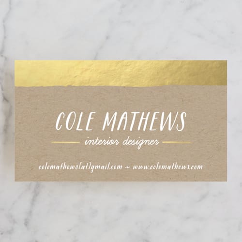 This is a kraft business cards by Hooray Creative called gold dip printing on signature in standard