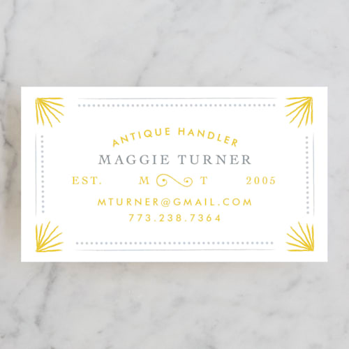 This is a gold business cards by Morgan Ramberg called chic & antique printing on signature in standard