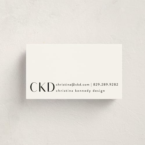 This is a noir business cards by Angela Garrick called monogram corner printing on signature in standard