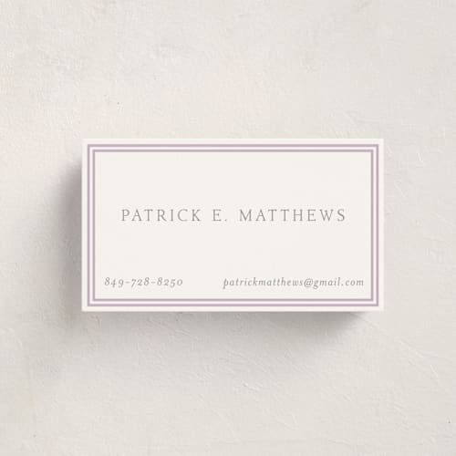 This is a lilac business cards by Megan Davis called frolic printing on signature in standard