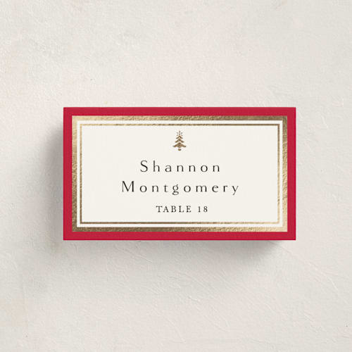 This is a poinsettia party stationery with foil pressed by Amy Kross called edged printing on signature in placecard