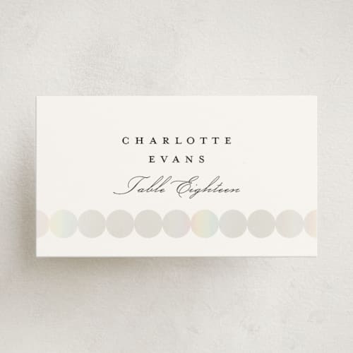 This is a silk wedding place cards with foil pressed by mo kelley called pearls printing on signature in placecard