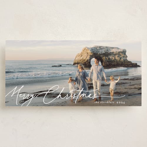This is a snow holiday photo cards with standard by Chris Griffith called holiday panorama printing on recycled smooth signature in tall