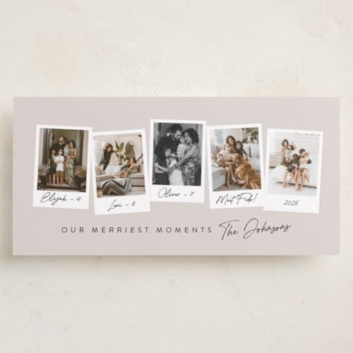 This is a linen holiday photo cards with standard by Meggy Masters called merriest momements printing on recycled smooth signature in tall