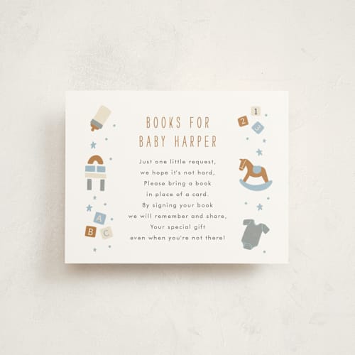 This is a powder blue baby shower insert cards with standard by JeAnna Casper called toys printing on signature in standard