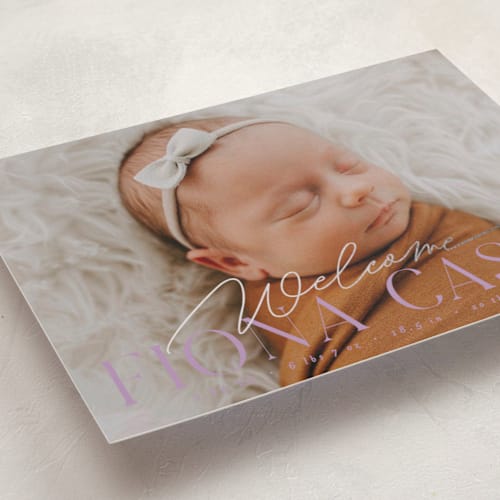 This is a lilac foil stamped birth announcements with foil pressed by Everett Paper Goods called welcoming printing on smooth signature in standard