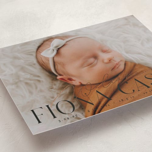 This is a charcoal foil stamped birth announcements with foil pressed by Everett Paper Goods called welcoming printing on smooth signature in standard