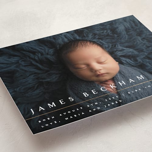 This is a snowfall foil stamped birth announcements with foil pressed by Melanie Kosuge called minimalist printing on smooth signature in standard