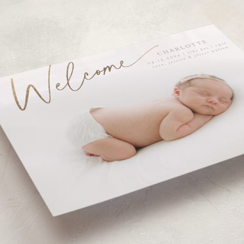 This is a almond foil stamped birth announcements with foil pressed by Deynaaz Daraei called dahlia printing on smooth signature in standard