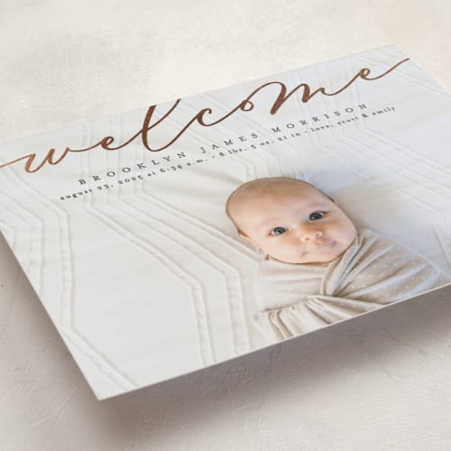 This is a charcoal foil stamped birth announcements with foil pressed by Erica Krystek called welcome ribbon printing on smooth signature in standard