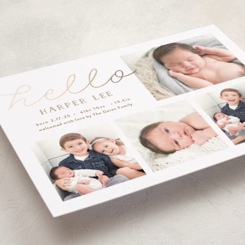 This is a honey foil stamped birth announcements with foil pressed by Carolyn MacLaren called glittering hello printing on smooth signature in standard