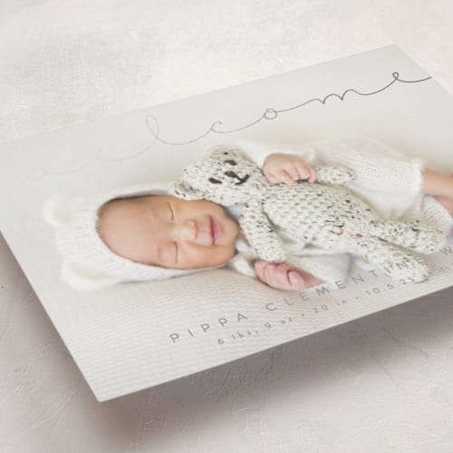This is a granite foil stamped birth announcements with foil pressed by Olivia Raufman called delicate welcome printing on smooth signature in standard